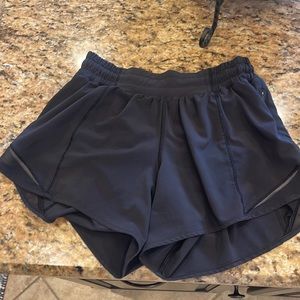 These are Lululemon, Hotty Hot, 4 inch inseam, size 4, shorts.